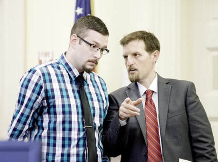 Timothy Danforth, left, talks with his co-counsel, Jeffrey Wilson, before the start of Danforth's murder trial in Franklin County Superior Court on Monday.