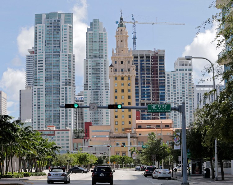 A high-rise building under construction Thursday is being built with construction cranes, which aren’t designed to withstand a storm of Irma’s ferocity.
