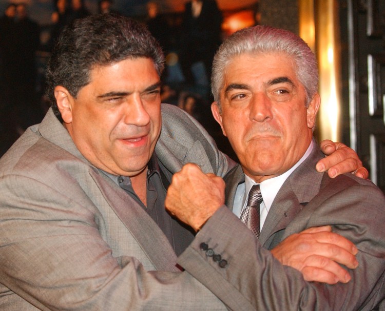 In this March 2, 2004 photo, actors Vincent Pastore, left, and Frank Vincent rough around for photographers at the fifth season premiere of the HBO series "The Sopranos," at New York's Radio City Music Hall. Vincent, a veteran character actor who often played tough guys, including mob boss Phil Leotardo on "The Sopranos," has died. He was 80.