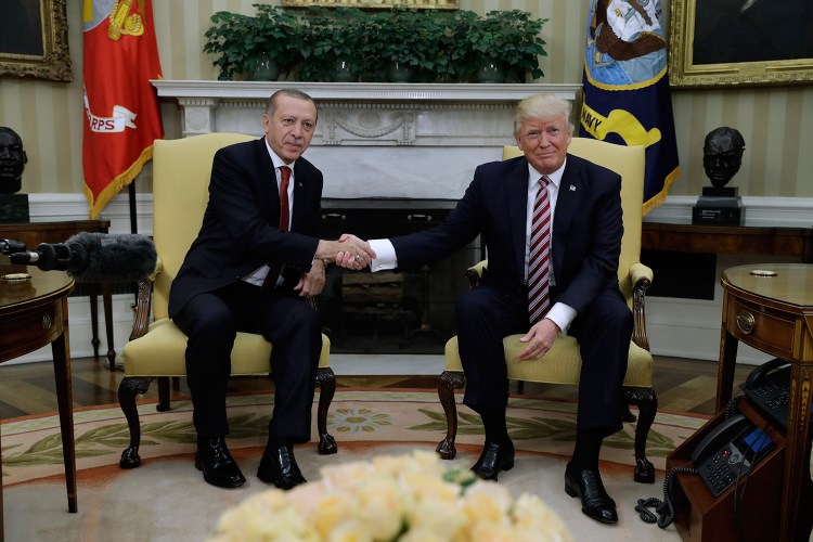 President Trump shakes hands with Turkish President Recep Tayyip Erdogan during their meeting in the Oval Office of the White House in May. In the four months since the violent attack on peaceful protesters by Turkish bodyguards during Erdogan's visit to Washington, nothing has made the Turkish government own up to this outrageous assault on democratic principles on American soil.