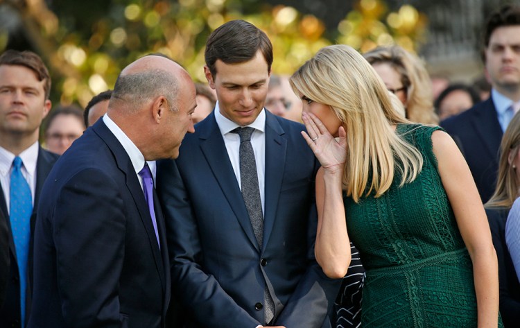White House senior adviser Jared Kushner stands between wife and fellow senior adviser Ivanka Trump and  White House Chief Economic Adviser Gary Cohn at the White House recently. Kushner has occasionally used a private account through his first nine months in government service.