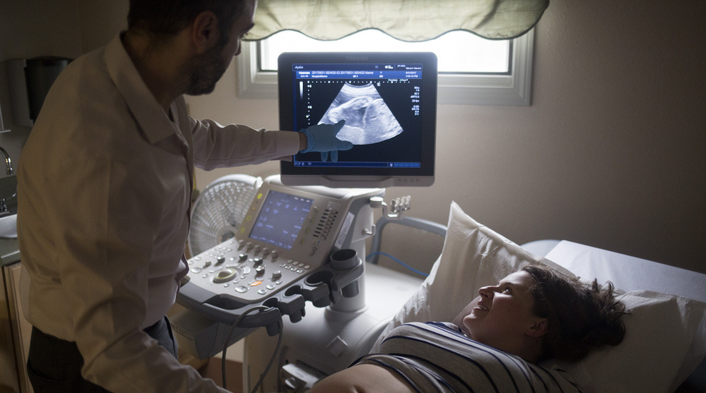 Dr. Hatem Hatem gives Celia Geel an ultrasound at Calais Regional Hospital on Aug. 31. Like over 200 hospitals nationwide have done in the past decade, Calais recently closed down its maternity wing.