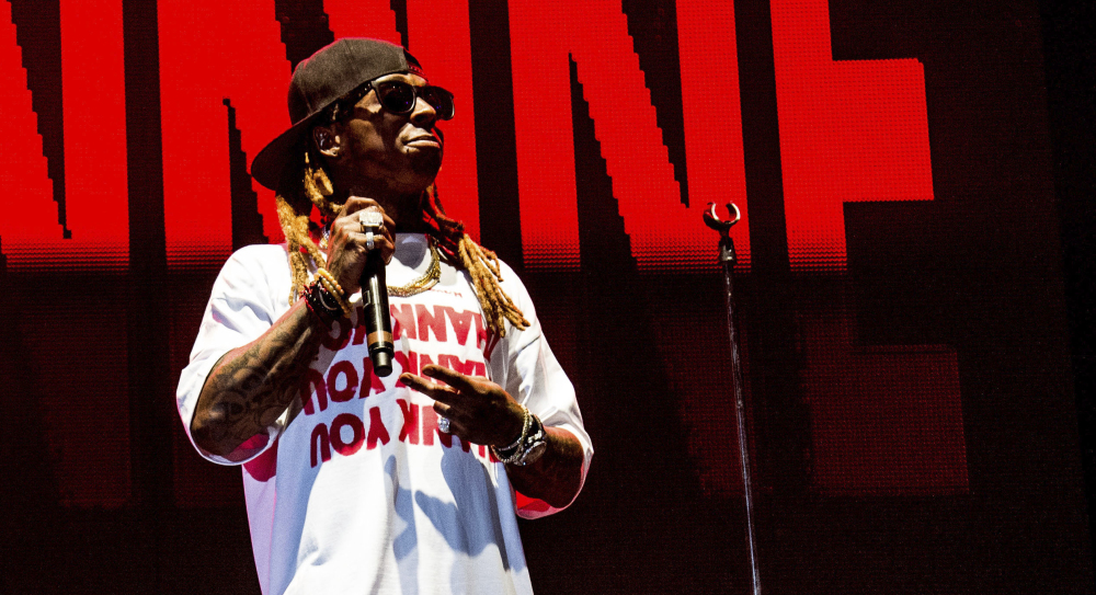 Lil Wayne, whose real name is Dwayne Michael Carter Jr., performs at a concert in New Orleans.