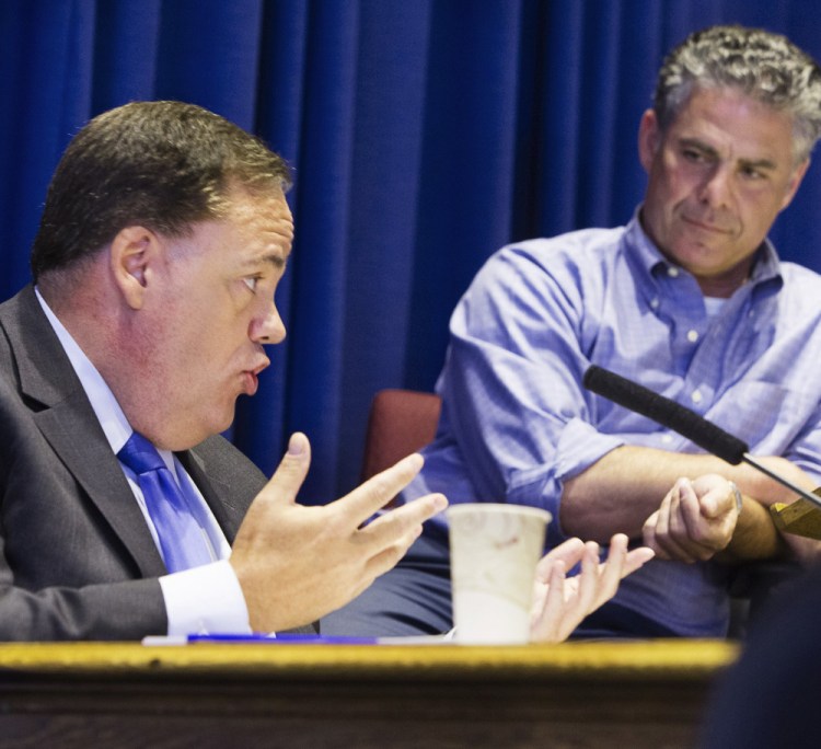 City Manager Jon Jennings, left, and Mayor Ethan Strimling have clashed frequently over what powers the City Charter grants the mayor's office.