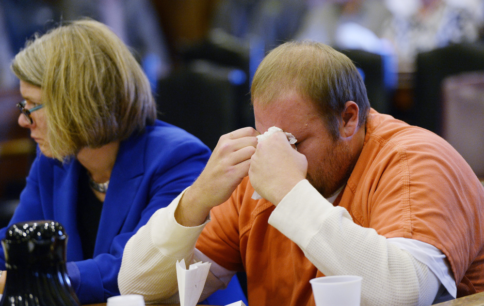Joshua McNally wipes away tears Monday after speaking at the Cumberland County Courthouse, where he was sentenced to six years for the motor vehicle death of Adam Perron.