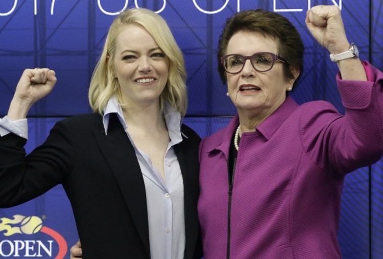 Actress Emma Stone and Billie Jean King pose for photos promoting the upcoming film "Battle of the Sexes." The film opened nationwide on Friday.