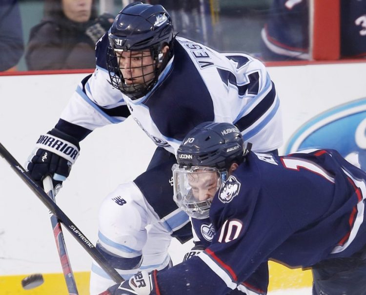 The University of Maine will be counting on Nolan Vesey, rear, the team's top returning scorer, among others as it takes on Connecticut in a two-game series at Orono to open the regular season this weekend.