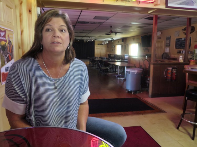Tammy Graceffa, 54, owner of the Hiawatha Bar and Grill in Sturtevant, Wis., is pleased the new Foxconn plant will boost the economy, but she might lose the land where she grew up.