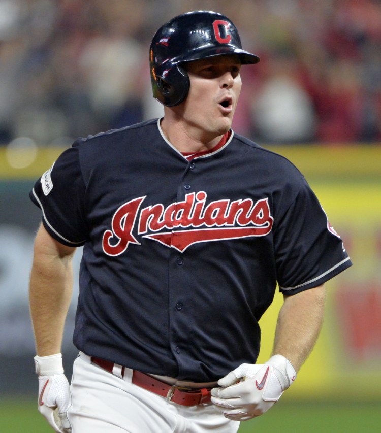 Jay Bruce of the Indians rounds the bases after hitting a solo home run off Yankees reliever David Robertson that tied Game 2 of their ALDS, 8-8, in the eighth inning Friday night.