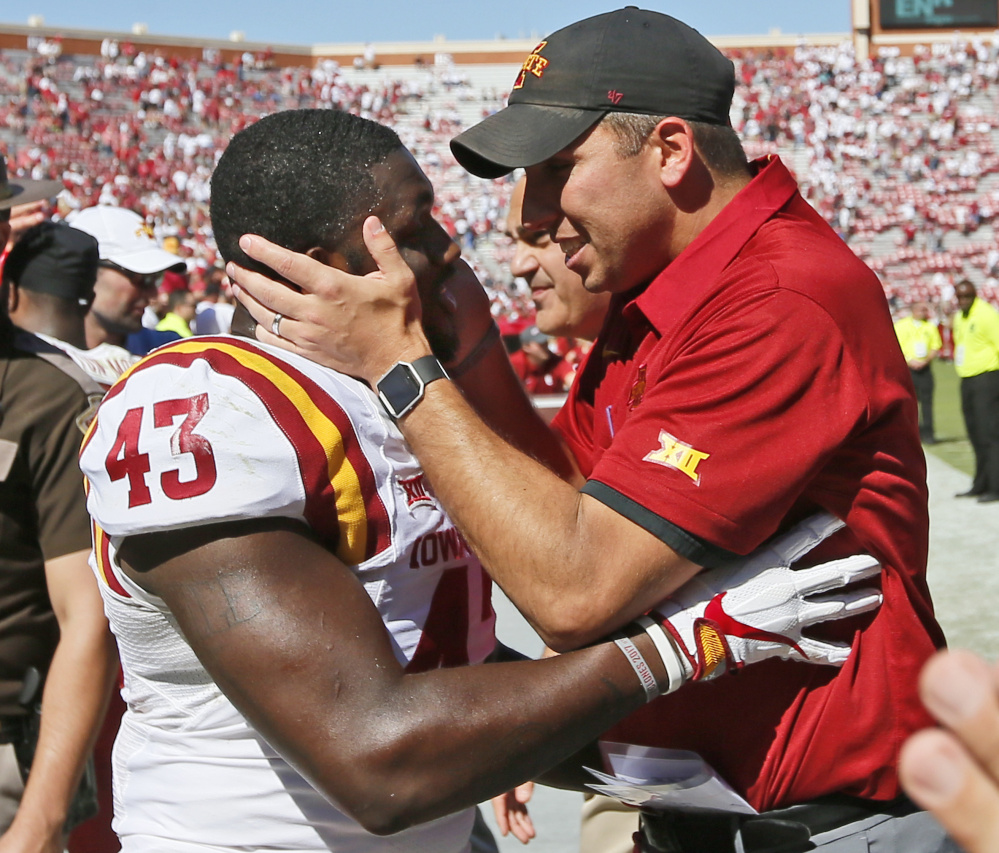 Iowa State Coach Matt Campbell celebrates with linebacker Tymar Sutton after the Cyclones upset No. 3 Oklahoma 38-31 on Saturday in Norman, Okla. The loss snapped Oklahoma's 14-game winning streak.