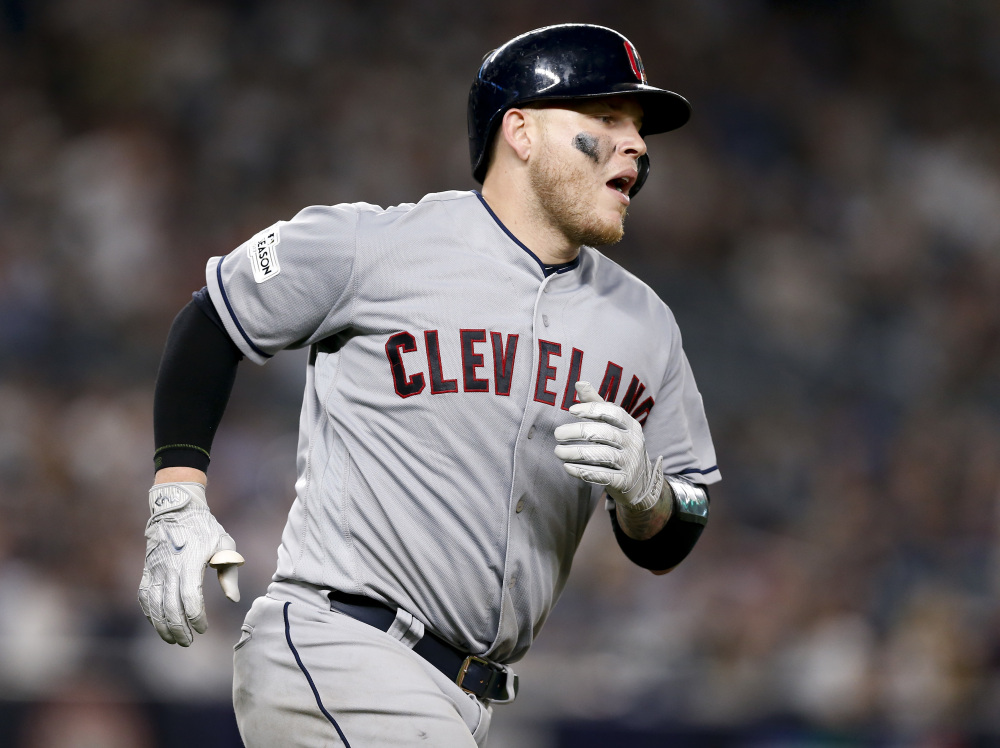 The Indians' Roberto Perez rounds the bases after hitting a solo home run in the fifth inning and cutting New York's lead to 5-3.
