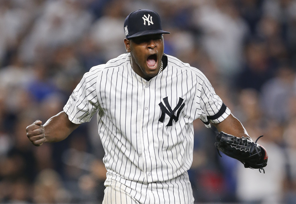 Yankees starter Luis Severino celebrates in the seventh inning of Monday night's American League Division Series game against Cleveland. Severino left with the lead, holding the Indians to three runs in seven innings.