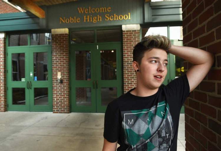 Stiles Zuschlag stands outside Noble High School in North Berwick. "I'm a transgender boy ready to change the world for the better," he said.