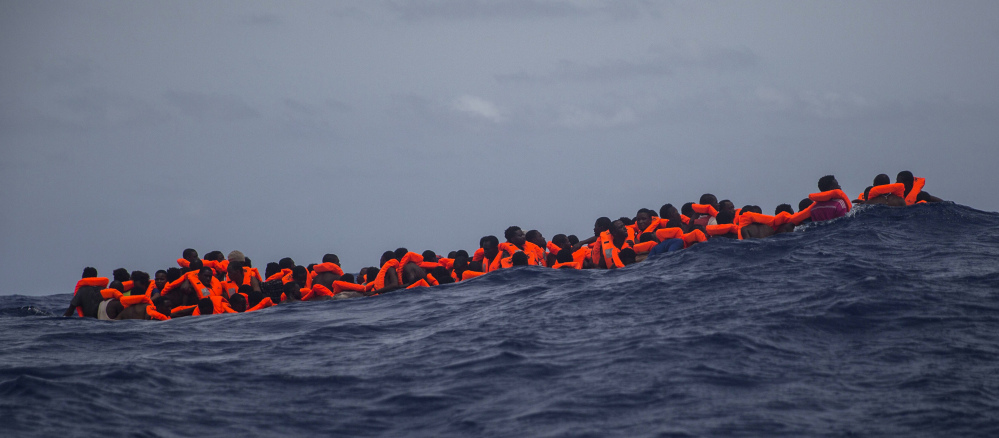 Sub-Saharan migrants wait to be rescued by aid workers off the coast of Libya in February.