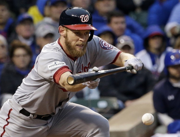 Stephen Strasburg not only struck out 12 and threw seven strong innings, but he also dropped down a sacrifice bunt in the fourth inning of Game 4 on Wednesday in Chicago.