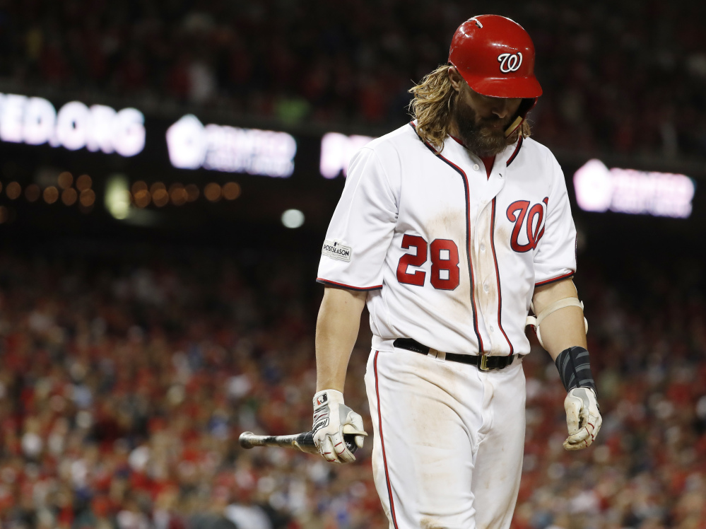 The Nationals' Jayson Werth walks away from the plate after striking out in the ninth inning.