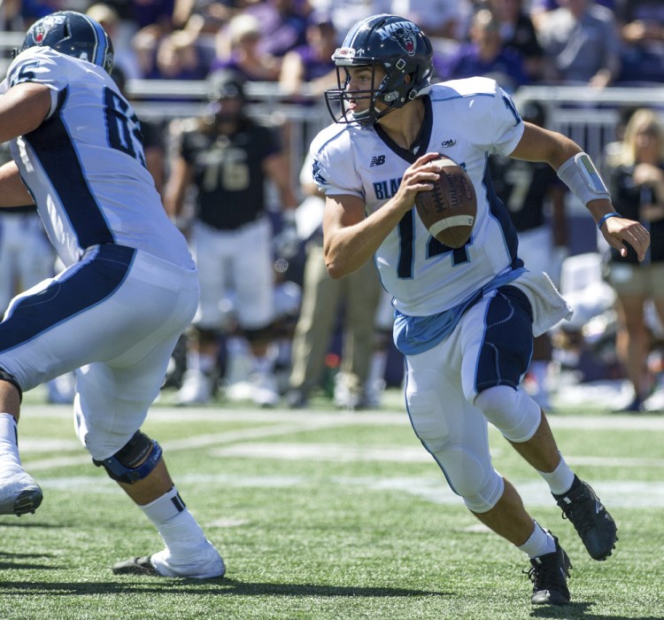 UMaine QB Chris Ferguson looks for an open receiver during a 28-10 loss to James Madison on Sept. 23. He threw three interceptions in that game and three more in a 31-0 loss to Villanova last weekend.