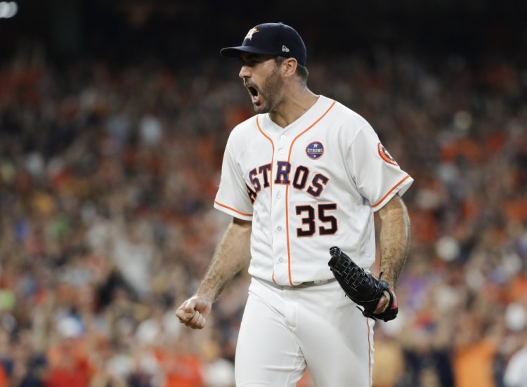 Houston starting pitcher Justin Verlander reacts after getting New York's Greg Bird to ground out to finish the ninth inning. The Astros' Jose Altuve scored from first on a double by Carlos Correa and Houston won 2-1.