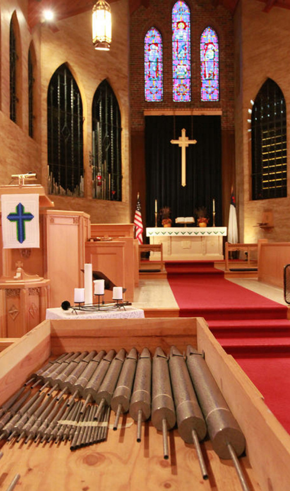Repaired and cleaned organ pipes lay in boxes at Blue Point Congregational Church in Scarborough before being reinstalled. The church raised $36,000 to refurbish the 61-year-old Austin organ and its 1,550 pipes.