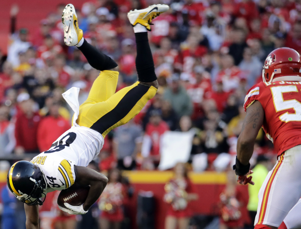 Steelers wide receiver Antonio Brown gets flipped by a tackle Sunday during Pittsburgh's 19-13 win over previously undefeated Kansas City.