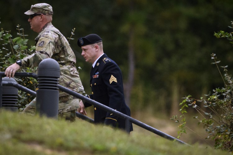 Sgt. Bowe Bergdahl, right, arrives for a motions hearing on Monday, Oct.16, 2017, on Fort Bragg. Bergdahl, who walked off his base in Afghanistan in 2009 and was held by the Taliban for five years, is charged with desertion and misbehavior before the enemy.