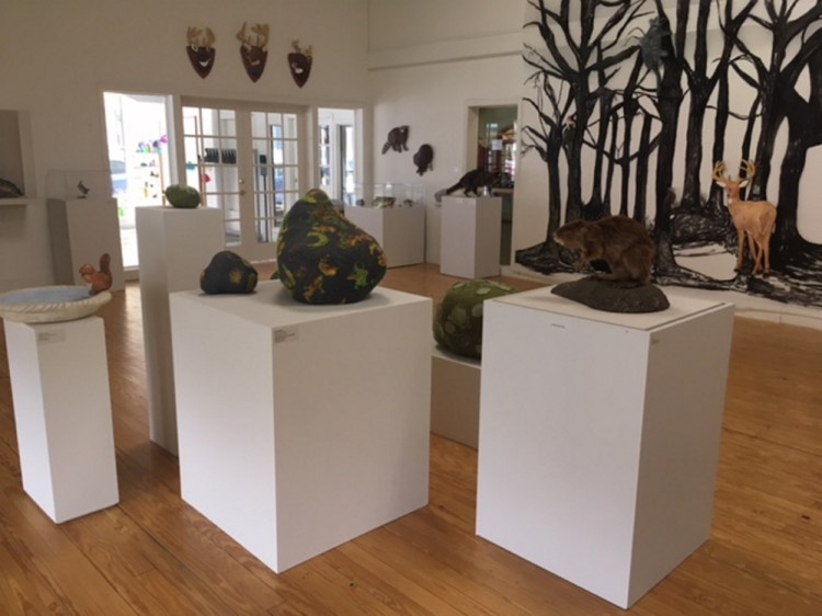 "Into the Forest" features Barbara Sullivan's fresco animals and Juliet Karelsen's needlework rocks and minerals along with taxidermied specimens from the nearby L.C. Bates Museum.
