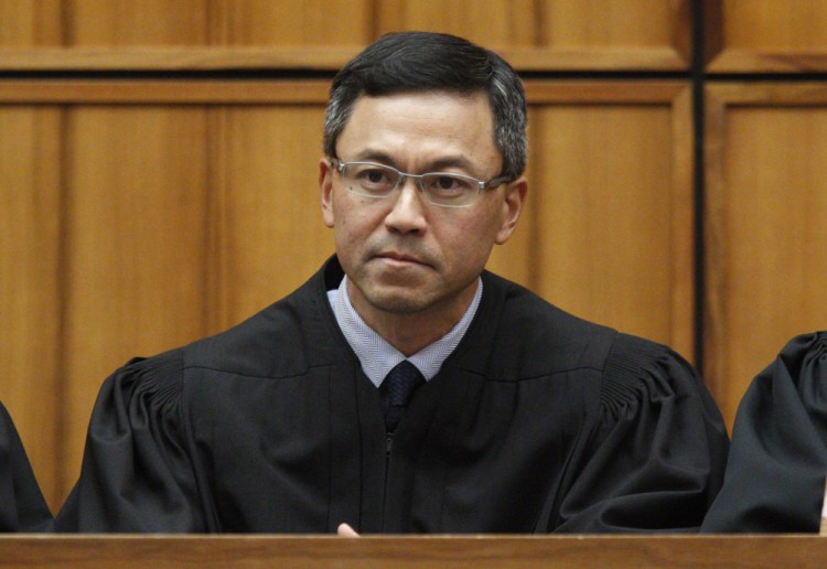 U.S. District Judge Derrick Watson in Honolulu blocked the Trump administration's latest travel ban, just hours before it was set to take effect. This is the third version that failed to pass constitutional muster.