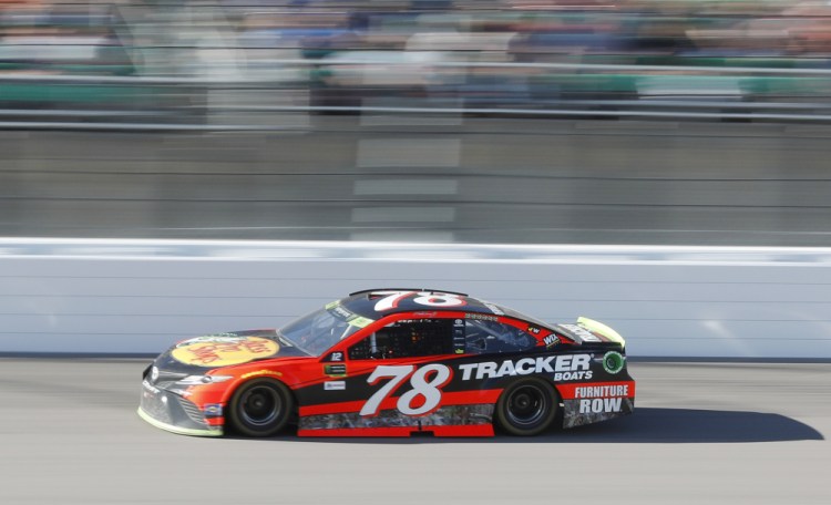 Martin Truex Jr. drives to the win in the NASCAR Cup Series race Sunday at Kansas Speedway in Kansas City, Kansas.