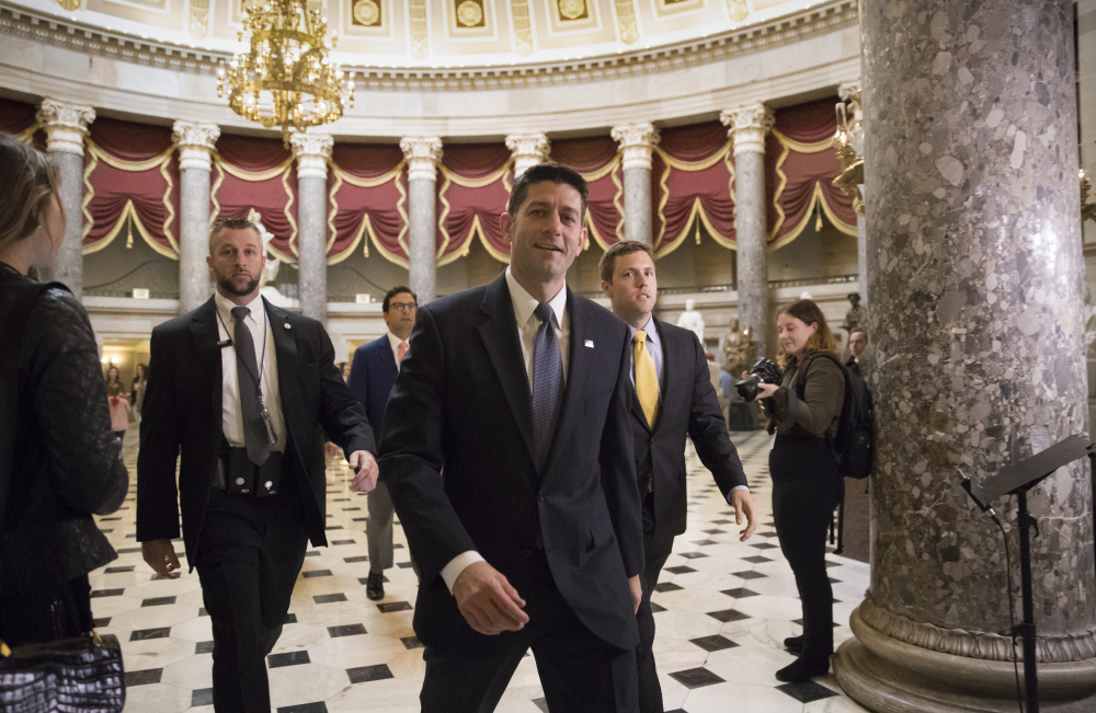 Speaker of the House Paul Ryan, R-Wis., strides to the chamber for the vote on the $4 trillion budget measure that will pave the way for a sweeping Republican tax overhaul, on Capitol Hill in Washington on  Thursday.