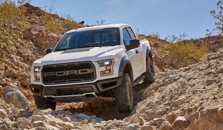 Sales of the popular F-Series trucks, like this F-150 Raptor, climbed 14 percent in the third quarter, while Ford's passenger-car sales have fallen.
