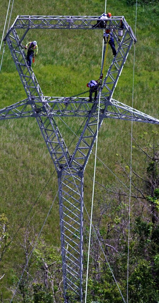 Whitefish Energy Holdings workers restore power lines earlier this month in Barceloneta, Puerto Rico.
Associated Press/Ramon Espinosa