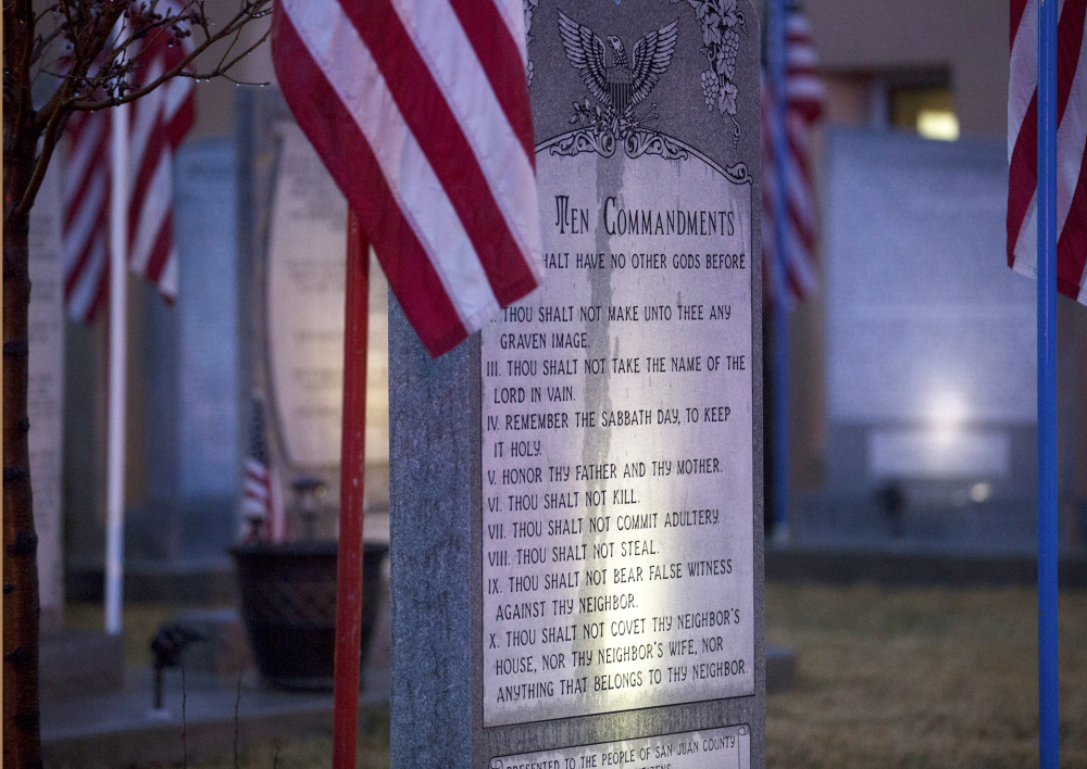 The Ten Commandments memorial stands at Bloomfield City Hall in Bloomfield, N.M. The U.S. Supreme Court last week sided with a ruling by the 10th U.S. Circuit Court of Appeals that ordered Bloomfield to remove the Ten Commandments monument from the lawn outside City Hall.