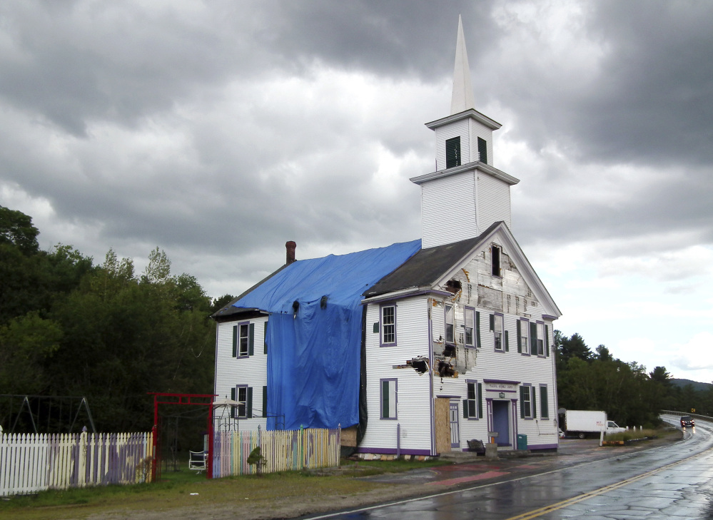 The Grafton Center Meetinghouse in Grafton, N.H., was damaged by a fire last year. 