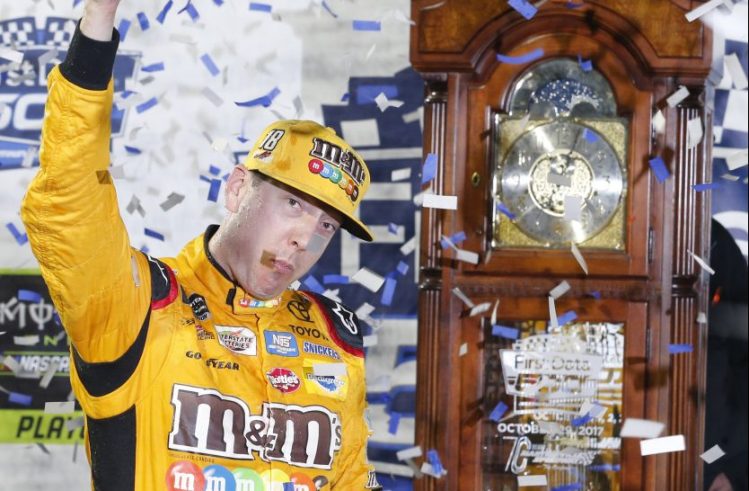 Kyle Busch celebrates after winning Sunday at Martinsville Speedway – his third victory in this year's first seven playoff races.