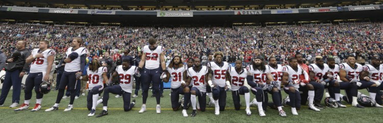All but 10 Houston Texans players took a knee during the national anthem after owner Bob McNair said, "We can't have the inmates running the prison," during a meeting of NFL owners about players around the league protesting, which has drawn criticism from President Trump.