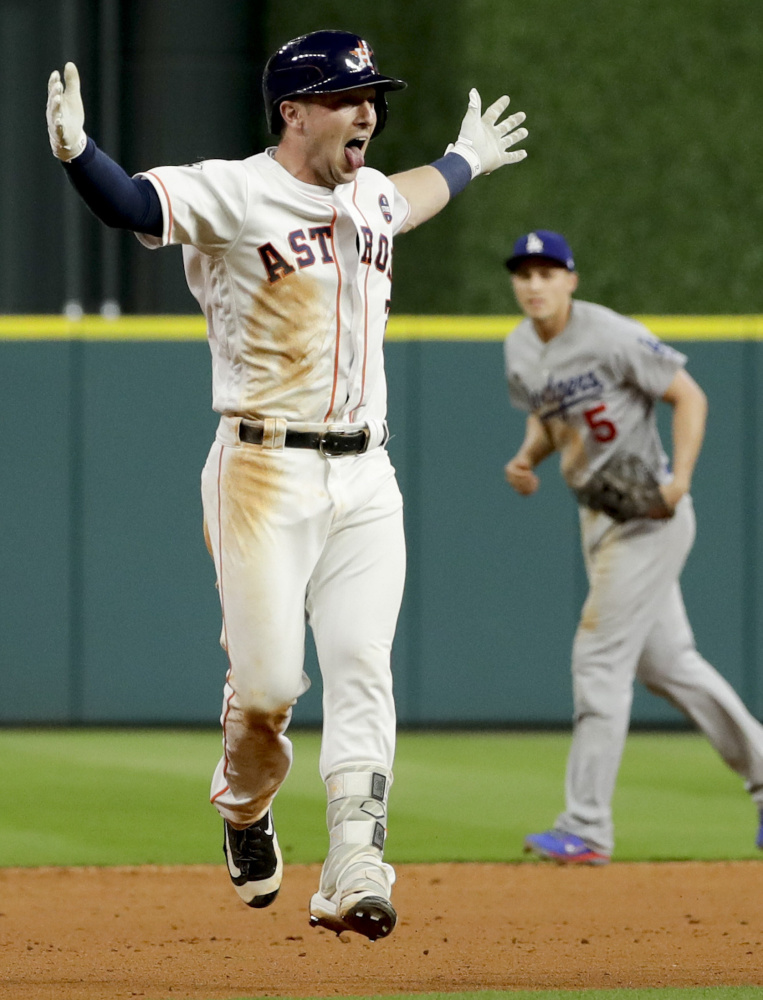 Alex Bregman has a tongue-wagging good time after driving in the winning run in the 10th inning of the Astros' 13-12 win over the Dodgers in Game 5 of the World Series.