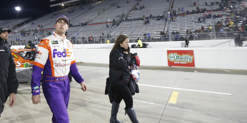 Denny Hamlin leaves the track after the NASCAR Cup series race at Martinsville Speedway in Virginia on Sunday. Hamlin wrecked with Chase Elliott during the last few laps.