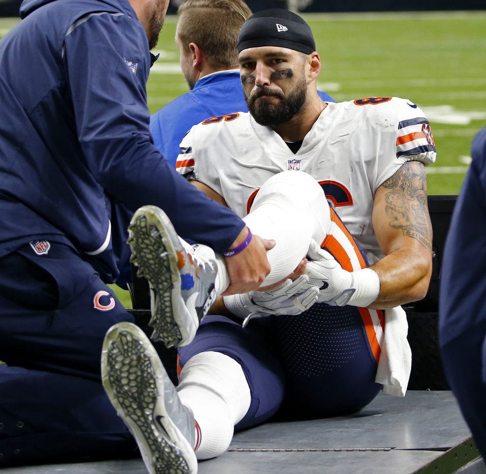 Chicago Bears tight end Zach Miller is taken off the field on a cart after injuring his leg Sunday. Miller dislocated his left knee and suffered popliteal artery damage and needed emergency surgery that might save his leg.