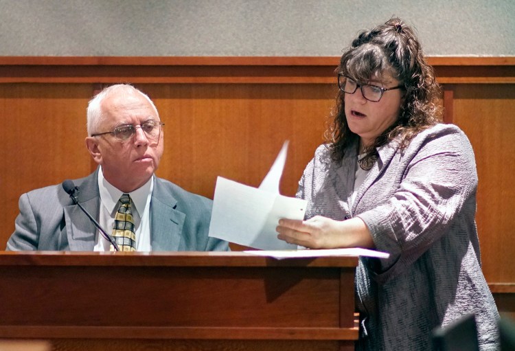 Retired Portland police detective James Daniels reviews a document related to the Jessica Briggs murder investigation with attorney Amy Fairfield on the 12th day of a post-conviction review for Anthony Sanborn Jr. at the Cumberland County Courthouse on Wednesday. Daniels was the lead detective in the investigation into the 1989 murder of Jessica Briggs. 