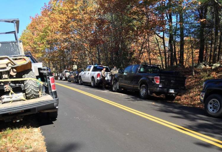 A woman was shot and killed off Greenwood Mountain Road in Hebron on Saturday morning.