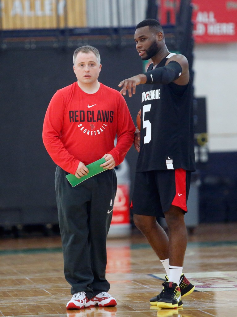 Kadeem Allen talks with head coach Brandon Bailey on Monday at the Portland Expo. Allen is one of two players for the Red Claws who will be able to shuttle between Maine and the Boston Celtics this season.