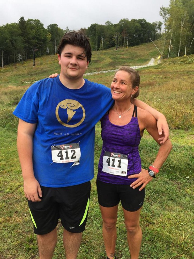 This photo posted in September 2016 to Alice Balcer's Facebook page shows Andrew Balcer, 17, and his mother, Alice, following a running competition. Andrew has been charged with two counts of murder in connection with the deaths of Alice and Antonio Balcer, his parents.