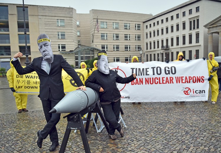 Activists of the International Campaign to Abolish Nuclear Weapons – ICAN – protest the ongoing nuclear standoff between North Korea and the United States in front of the U.S. Embassy in Berlin on Sept. 13, 2017.