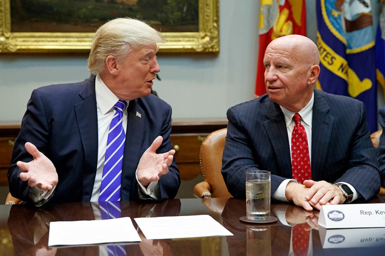 Chairman of the House Ways and Means Committee Rep. Kevin Brady, R-Texas, meets with  President Trump at the  White House on Sept. 26, 2017. 