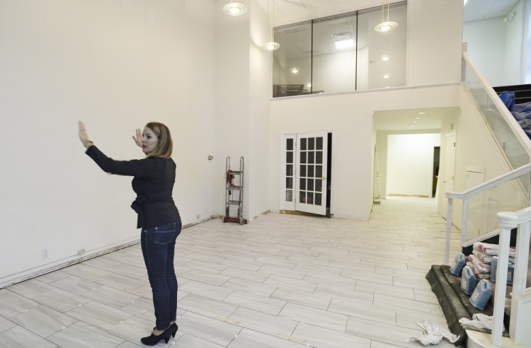 Heather Ashby, founder of CoworkHERS, is converting part of the building at 411 and 415 Congress St. into a space that will feature offices, lounge areas, meeting rooms, a library, lockers and a fitness room.