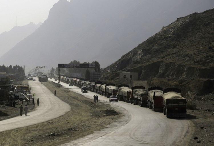 Trucks line up to enter Pakistan at the Torkhum border crossing in Afghanistan. There are 235 crossing points, some frequently used by militants and drug traffickers.
