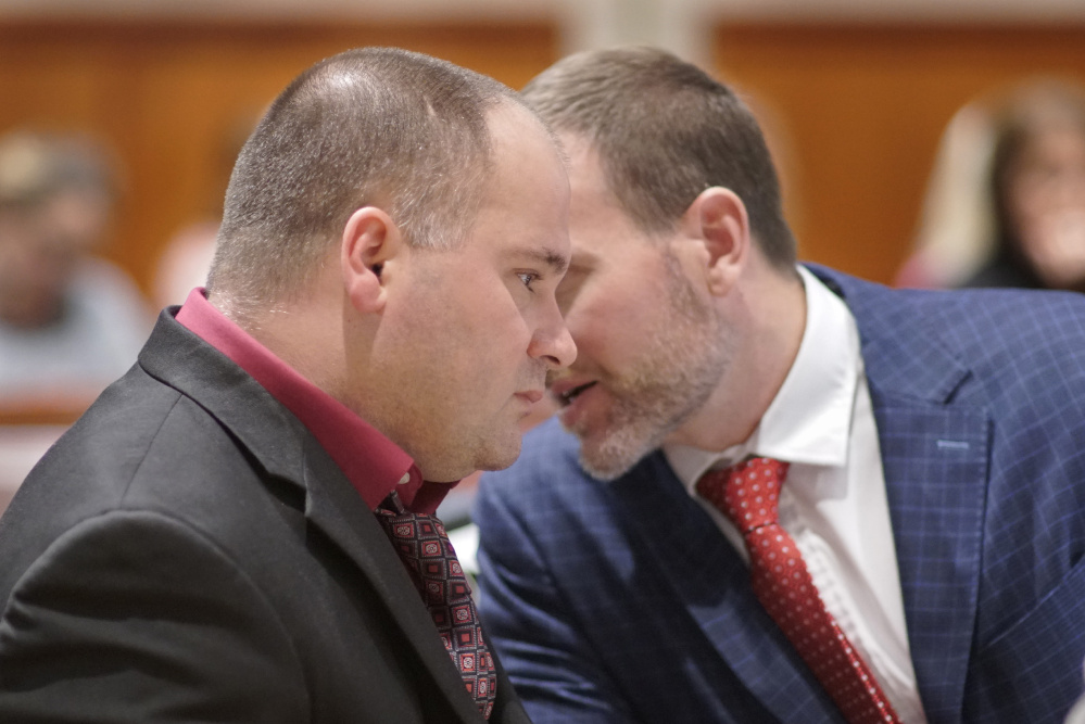 Attorney Timothy Zerillo consults Monday with Anthony H. Sanborn Jr. during testimony at his post-conviction review.