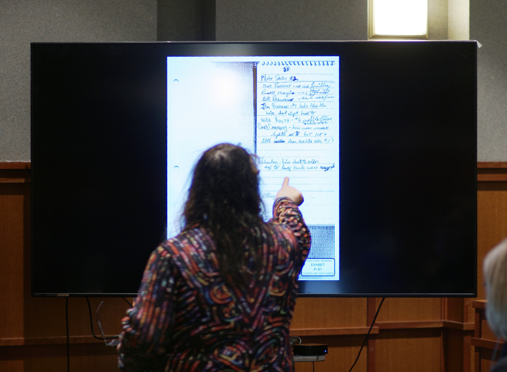 Attorney Amy Fairfield points out descriptions of people in a detective's notebook while questioning Ned Chester during the post-conviction review of Anthony Sanborn at the Cumberland County Courthouse on Monday. Chester was one of Sanborn's attorneys during his 1992 trial for murder.