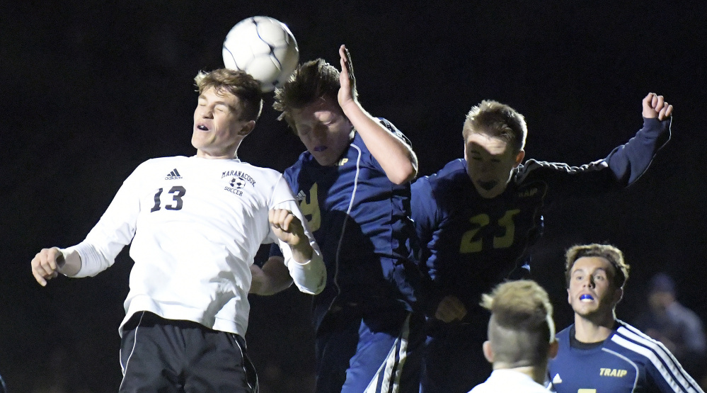 Maranacook senior midfielder Silas Mohlar, left, goes head-to-head with Traip defenders during the Class C South championship game last Wednesday at Ricky Gibson Field of Dreams in Readfield.