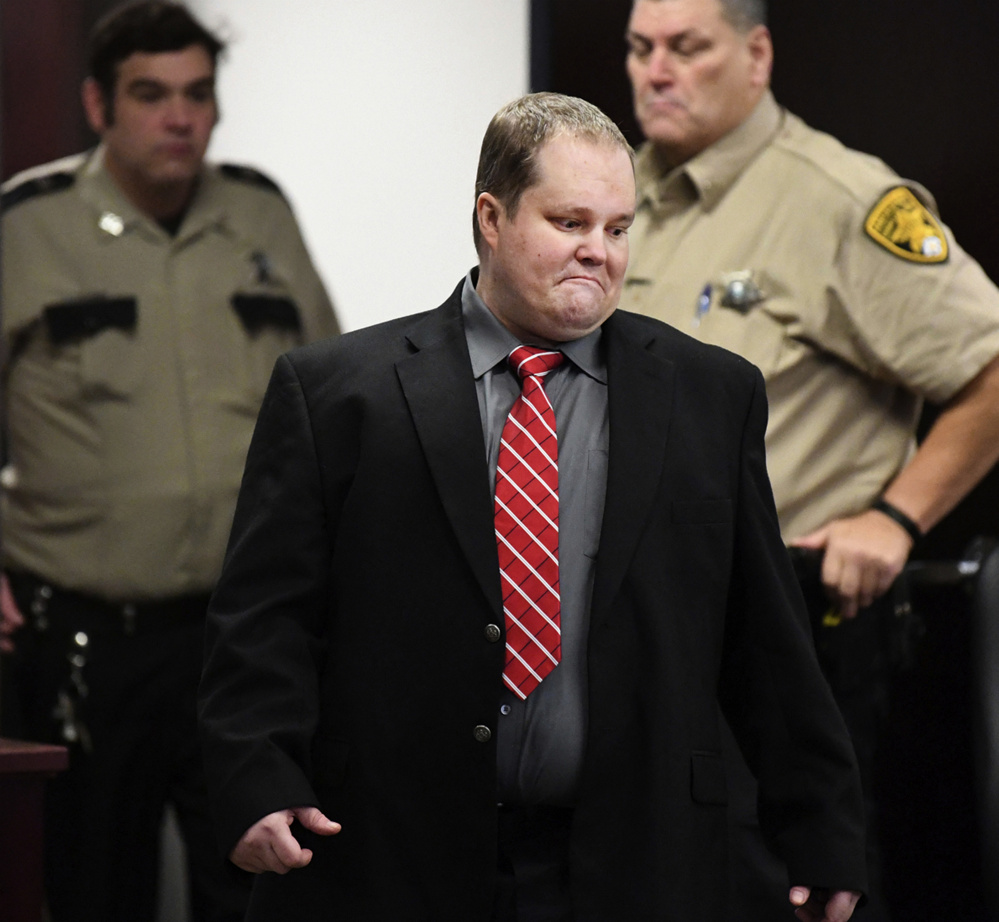 William Hudson walks into court on Nov. 1, the first day of his trial in Bryan, Texas. A jury took only 20 minutes Tuesday to find Hudson guilty of capital murder in the 2015 deaths of six people, including two from Maine. Authorities say William Hudson got angry after learning that two families had cut a lock to a gate to gain access to land they owned for a weekend of camping.
